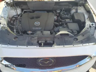 2018 Mazda CX-5 Grand Touring с VIN JM3KFADM3J1351532, выставлен на аукционе Copart как лот 55567405 с пробегом 99 134 миль миль и Списание • Salvage title. История ставок и продаж доступна на DreamBid. Изображение 11.