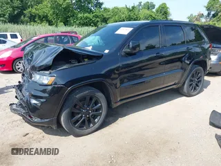 2018 Jeep Grand Cherokee Upland with VIN 1C4RJFAG2JC350975, listed as a IAAI auction lot 42612836 with 148,435 mi miles and . Bid and sale history available at DreamBid. Image 17.