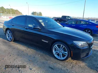 2012 BMW 7 Series 750i with VIN WBAKA8C56CCY37783, listed as a IAAI auction lot 41146308 with 1 mi miles. Bid and sale history available at carsss.com. Image 1.