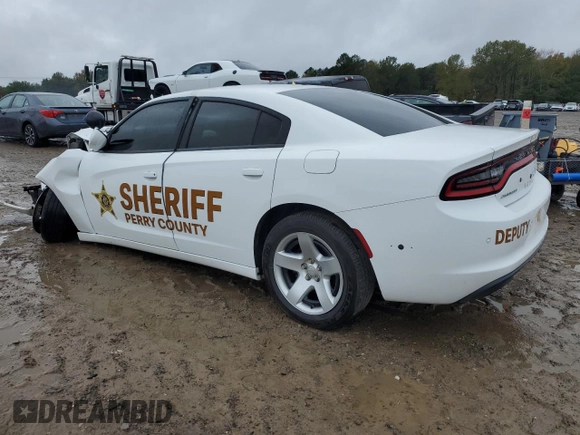 2019 Dodge Charger Police with VIN 2C3CDXAG3KH547577, listed as a Copart auction lot 79106194 with 81,077 mi miles and Salvage Title. Bid and sale history available at DreamBid. Image 2.