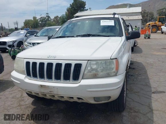 2002 Jeep Grand Cherokee Limited with VIN 1J4GX58S52C305020, listed as a IAAI auction lot 42025324 with 214,214 mi miles and . Bid and sale history available at DreamBid. Image 6.