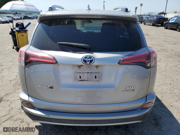 2018 Toyota RAV4 Hybrid LE Plus with VIN JTMRJREVXJD252457, listed as a Copart auction lot 43460395 with 47,159 mi miles and Salvage Title. Bid and sale history available at carsss.com. Image 6.
