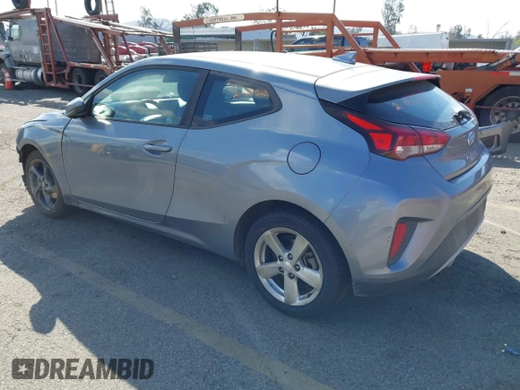 2019 Hyundai Veloster 2.0 with VIN KMHTG6AF8KU019854, listed as a IAAI auction lot 41697113 with 123,851 mi miles. Bid and sale history available at carsss.com. Image 3.