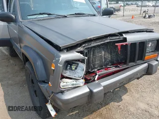 2000 Jeep Cherokee with VIN 1J4FF48S5YL159414, listed as a IAAI auction lot 42416639 with 177,932 mi miles and . Bid and sale history available at DreamBid. Image 6.