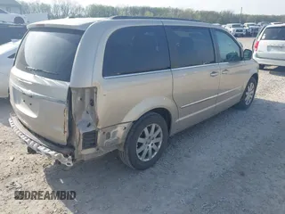 2014 Chrysler Town & Country Touring with VIN 2C4RC1BG0ER422698, listed as a IAAI auction lot 42086592 with 66,659 mi miles. Bid and sale history available at carsss.com. Image 4.