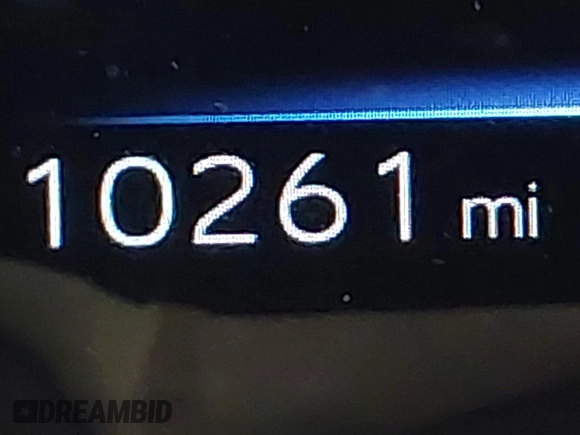 2023 Toyota bZ4X XLE z VIN JTMABACA3PA038951, wystawiony jako IAAI lot #41961433 z przebiegiem 10 261 mil mil oraz . Historia ofert i sprzedaży dostępna na DreamBid. Obrazek 7.