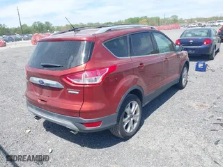 2015 Ford Escape Titanium with VIN 1FMCU0JX5FUB77475, listed as a IAAI auction lot 42103388 with 113,018 mi miles. Bid and sale history available at carsss.com. Image 16.