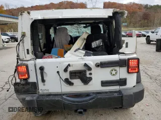 2017 Jeep Wrangler Willys Wheeler with VIN 1C4AJWAG7HL589574, listed as a Copart auction lot 79006504 with 117,075 mi miles and Salvage Title. Bid and sale history available at DreamBid. Image 6.