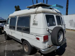 1994 GMC Vandura z VIN 1GDEG25KXRF519134, wystawiony jako Copart lot #75056124 z przebiegiem 245 597 mil mil oraz Szkody całkowita. Historia ofert i sprzedaży dostępna na DreamBid. Obrazek 2.