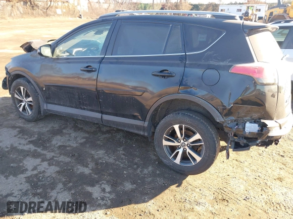 2018 Toyota RAV4 XLE with VIN 2T3RFREV2JW811214, listed as a IAAI auction lot 41458588 with 236,346 mi miles. Bid and sale history available at carsss.com. Image 3.