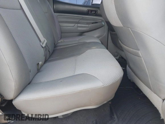 2014 Toyota Tacoma with VIN 3TMLU4EN3EM159080, listed as a IAAI auction lot 41809259 with 113,950 mi miles and . Bid and sale history available at DreamBid. Image 8.