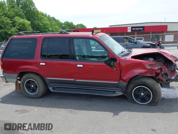 2000 Ford Explorer XLT z VIN 1FMZU73E7YZB60956, wystawiony jako IAAI lot #42218666 z przebiegiem 234 289 mil mil oraz . Historia ofert i sprzedaży dostępna na DreamBid. Obrazek 14.