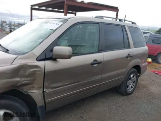 2004 Honda Pilot EX with VIN 2HKYF18594H523176, listed as a IAAI auction lot 41937743 with 310,344 mi miles. Bid and sale history available at carsss.com. Image 14.