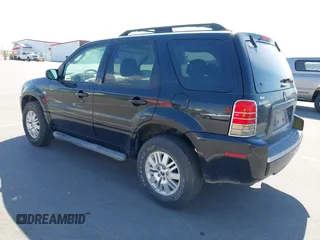 2006 Mercury Mariner Luxury with VIN 4M2YU56186DJ00220, listed as a IAAI auction lot 42174056 with 208,820 mi miles and . Bid and sale history available at DreamBid. Image 3.