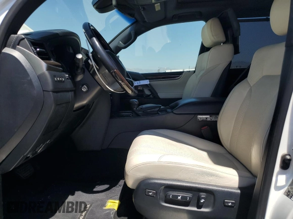 2020 Lexus LX 570 z VIN JTJDY7AX5L4319404, wystawiony jako Copart lot #69185424 z przebiegiem 46 324 mil mil oraz Szkoda całkowita • Salvage title. Historia ofert i sprzedaży dostępna na DreamBid. Obrazek 7.