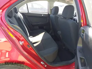 2016 Mitsubishi Lancer ES z VIN JA32U2FU3GU001857, wystawiony jako IAAI lot #41999674 z przebiegiem 65 520 mil mil oraz . Historia ofert i sprzedaży dostępna na DreamBid. Obrazek 8.