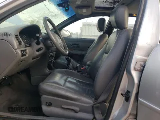 2000 Oldsmobile Intrigue GLS z VIN 1G3WX52H0YF233648, wystawiony jako Copart lot #72619824 z przebiegiem Nie podano mil oraz Nie do naprawy. Historia ofert i sprzedaży dostępna na DreamBid. Obrazek 7.