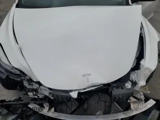 2023 Tesla Model 3 z VIN 5YJ3E1EA1PF561521, wystawiony jako Copart lot #55637855 z przebiegiem 83 008 mil mil oraz Szkoda całkowita • Salvage title. Historia ofert i sprzedaży dostępna na DreamBid. Obrazek 11.