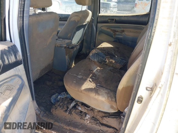 2006 Toyota Tacoma z VIN 3TMLU42N26M004719, wystawiony jako IAAI lot #40569250 z przebiegiem Nie podano mil oraz . Historia ofert i sprzedaży dostępna na DreamBid. Obrazek 8.
