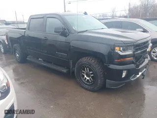 2016 Chevrolet Silverado 1500 LT with VIN 3GCUKREC5GG157547, listed as a IAAI auction lot 41418517 with 147,709 mi miles. Bid and sale history available at carsss.com. Image 1.