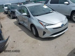 2016 Toyota Prius Two z VIN JTDKBRFU7G3002502, wystawiony jako IAAI lot #42241469 z przebiegiem 120 049 mil mil oraz . Historia ofert i sprzedaży dostępna na DreamBid. Obrazek 1.