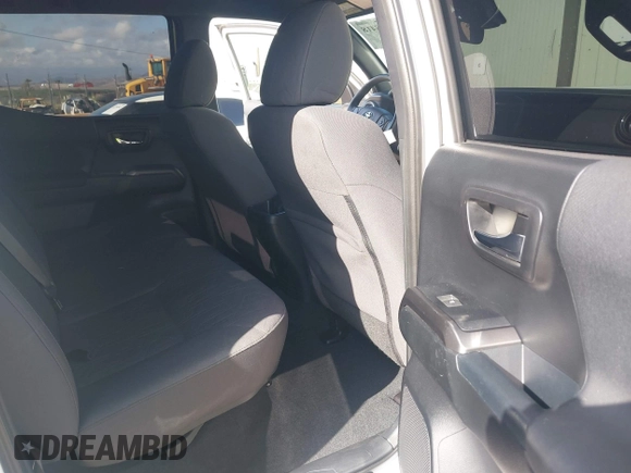2018 Toyota Tacoma SR5 with VIN 3TMDZ5BN2JM037580, listed as a IAAI auction lot 42248418 with 35,661 mi miles and . Bid and sale history available at DreamBid. Image 8.