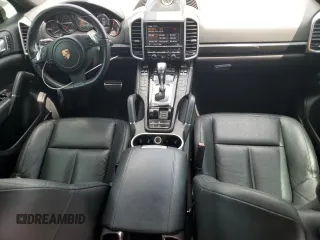 2013 Porsche Cayenne S с VIN WP1AB2A22DLA83248, выставлен на аукционе Copart как лот 55978885 с пробегом 163 380 миль миль и На запчасти • Non repairable. История ставок и продаж доступна на DreamBid. Изображение 8.