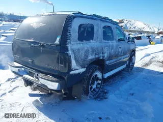2002 Chevrolet Tahoe LT with VIN 1GNEK13Z62J281810, listed as a IAAI auction lot 41373655 with 161,157 mi miles. Bid and sale history available at carsss.com. Image 4.