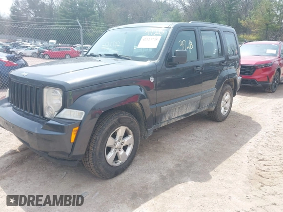 2011 Jeep Liberty Sport 70th Anniversary with VIN 1J4PN2GK6BW595515, listed as a IAAI auction lot 42123728 with 313,980 mi miles and . Bid and sale history available at DreamBid. Image 2.