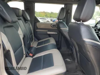 2022 Ford Bronco z VIN 1FMEE5DP6NLB28658, wystawiony jako Copart lot #60632405 z przebiegiem 28 221 mil mil oraz Szkoda całkowita • Salvage title. Historia ofert i sprzedaży dostępna na DreamBid. Obrazek 11.