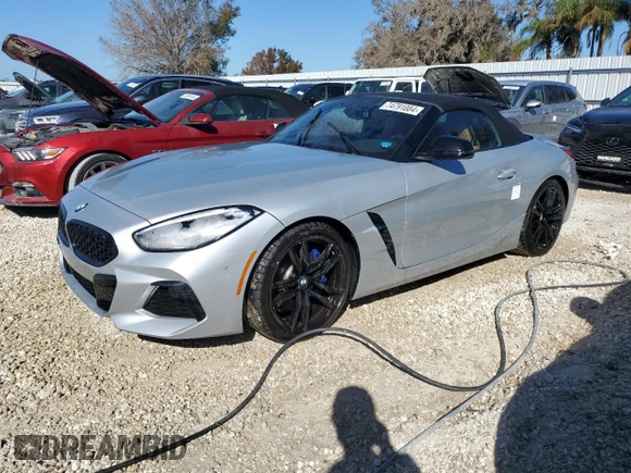 2022 BMW Z4 sDrive30i with VIN WBAHF3C03NWX80169, listed as a Copart auction lot 74791084 with 0 mi miles and Salvage Title. Bid and sale history available at carsss.com. Image 1.