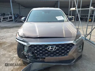 2020 Hyundai Santa Fe SE with VIN 5NMS23AD6LH220012, listed as a IAAI auction lot 42317046 with 141,055 mi miles and . Bid and sale history available at DreamBid. Image 12.