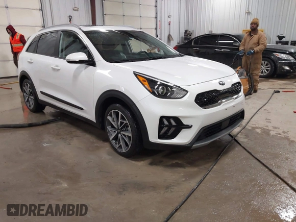 2021 Kia Niro Touring with VIN KNDCC3LC3M5463514, listed as a IAAI auction lot 41564596 with 29,063 mi miles. Bid and sale history available at carsss.com. Image 1.