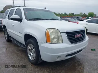 2009 GMC Yukon SLT w/4SA with VIN 1GKFK33049R153415, listed as a IAAI auction lot 41896770 with 182,256 mi miles. Bid and sale history available at carsss.com. Image 1.