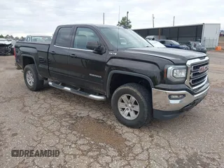 2018 GMC Sierra 1500 SLE z VIN 1GTV2MEC1JZ334402, wystawiony jako IAAI lot #42139543 z przebiegiem 74 557 mil mil oraz . Historia ofert i sprzedaży dostępna na DreamBid. Obrazek 1.