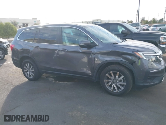 2021 Honda Pilot EX-L with VIN 5FNYF5H54MB018846, listed as a IAAI auction lot 41208987 with 80,757 mi miles and . Bid and sale history available at DreamBid. Image 6.