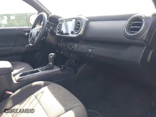 2017 Toyota Tacoma SR5 with VIN 5TFSZ5AN7HX056929, listed as a IAAI auction lot 42079525 with 82,619 mi miles. Bid and sale history available at carsss.com. Image 5.