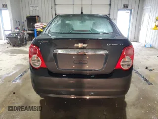 2014 Chevrolet Sonic LT with VIN 1G1JC5SH4E4239958, listed as a Copart auction lot 46082295 with 128,275 mi miles and Salvage Title. Bid and sale history available at DreamBid. Image 6.