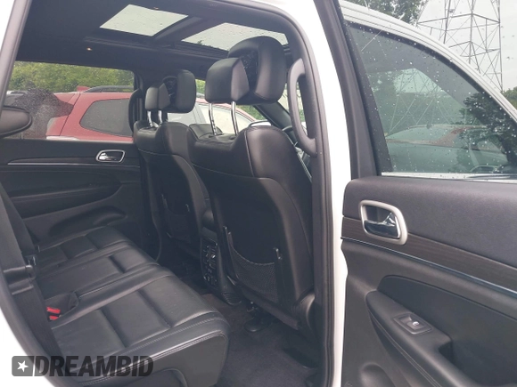 2018 Jeep Grand Cherokee Limited with VIN 1C4RJFBG8JC417240, listed as a IAAI auction lot 42476411 with 77,080 mi miles and . Bid and sale history available at DreamBid. Image 8.