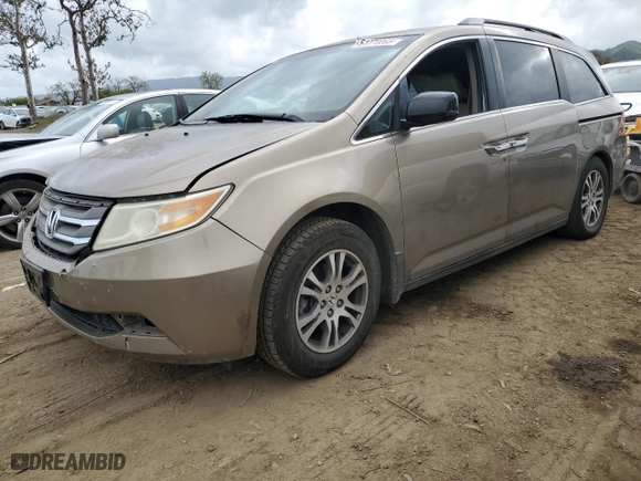 2011 Honda Odyssey EX-L with VIN 5FNRL5H62BB084010, listed as a Copart auction lot 51070065 with 217,422 mi miles and Salvage Title. Bid and sale history available at carsss.com. Image 1.