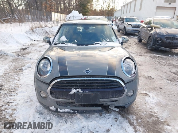 2019 MINI Hardtop Cooper with VIN WMWXP5C52K2H91038, listed as a IAAI auction lot 41509304 with 77,123 mi miles and . Bid and sale history available at DreamBid. Image 12.