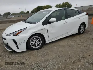 2021 Toyota Prius L Eco with VIN JTDKAMFU9M3146148, listed as a Copart auction lot 60747745 with 145,146 mi miles and Salvage title. Bid and sale history available at DreamBid. Image 1.