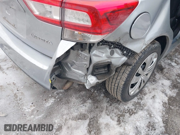 2018 Subaru Impreza with VIN 4S3GTAA65J1740704, listed as a IAAI auction lot 41723889 with 53,679 mi miles. Bid and sale history available at carsss.com. Image 6.