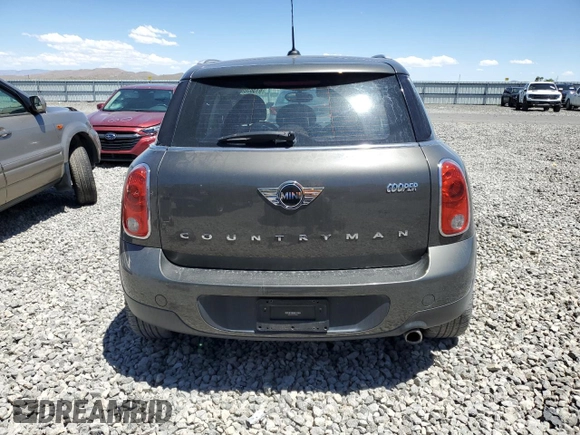 2014 MINI Countryman with VIN WMWZB3C56EWR38919, listed as a Copart auction lot 61385865 with 127,368 mi miles and Salvage title. Bid and sale history available at DreamBid. Image 6.