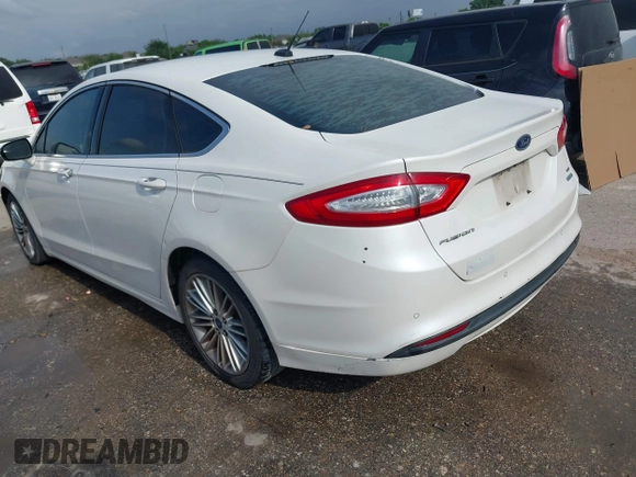2014 Ford Fusion SE with VIN 3FA6P0HD8ER169211, listed as a IAAI auction lot 42038877 with 215,769 mi miles. Bid and sale history available at carsss.com. Image 3.