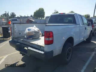 2007 Ford F-150 XLT with VIN 1FTPX14527KD42148, listed as a IAAI auction lot 42077816 with 267,360 mi miles. Bid and sale history available at carsss.com. Image 4.