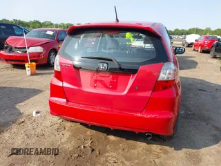 2009 Honda Fit z VIN JHMGE88219S023503, wystawiony jako IAAI lot #42376165 z przebiegiem 142 166 mil mil oraz . Historia ofert i sprzedaży dostępna na DreamBid. Obrazek 17.