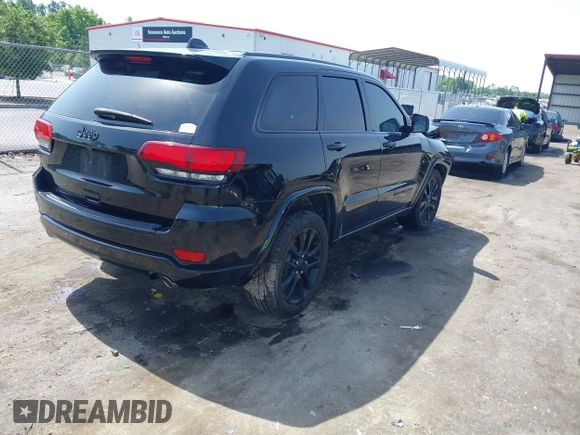 2018 Jeep Grand Cherokee Altitude with VIN 1C4RJEAG7JC354191, listed as a IAAI auction lot 42276081 with 51,220 mi miles and . Bid and sale history available at DreamBid. Image 4.