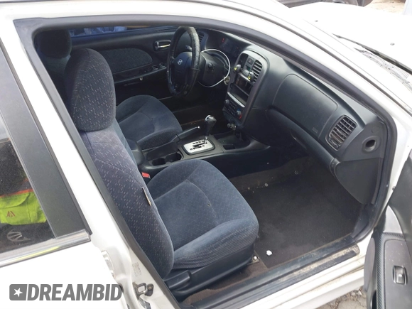 2003 Hyundai Sonata with VIN KMHWF25S13A830754, listed as a IAAI auction lot 41409518 with 207,849 mi miles. Bid and sale history available at carsss.com. Image 5.