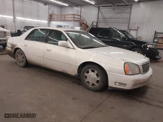 2005 Cadillac DeVille with VIN 1G6KD54Y25U117852, listed as a IAAI auction lot 41462310 with 167,000 mi miles. Bid and sale history available at carsss.com. Image 1.